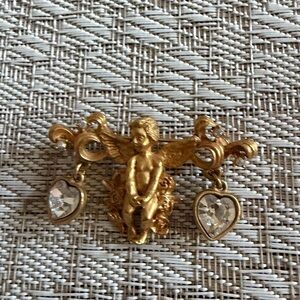 Kirks Folly cherub brooch